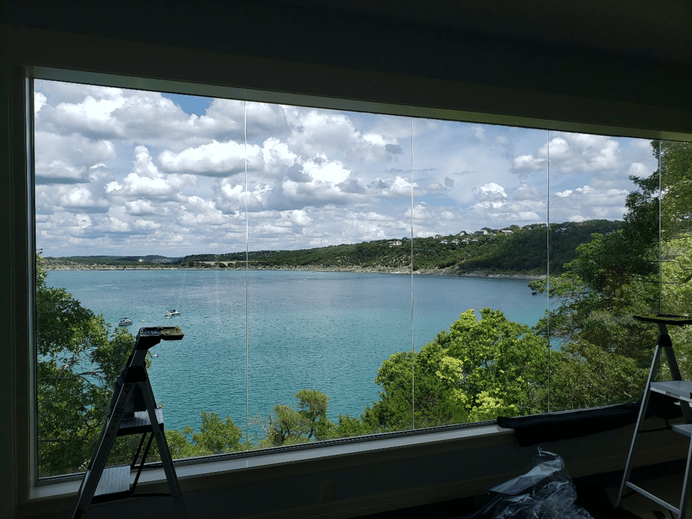 view of canyon lake through window with huper optik window film applied